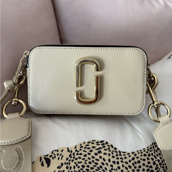 Marc Jacobs Handbags - Marc Jacobs Beige Crossbody Bag with Gold Accents